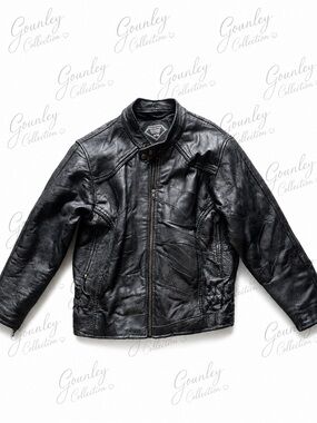 Women’s small genuine leather jacket and free bracelet that says freedom